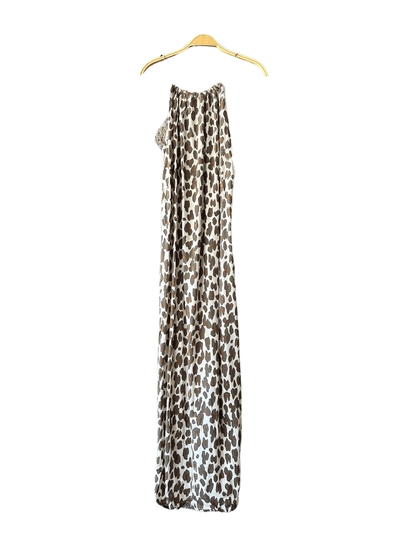 Robe longue dos nu en viscose à imprimé léopard, pour une allure sauvage et sophistiquée. Un must-have pour toutes les fashionistas en quête d'un look tendance. Achetez en ligne et bénéficiez de la livraison gratuite.