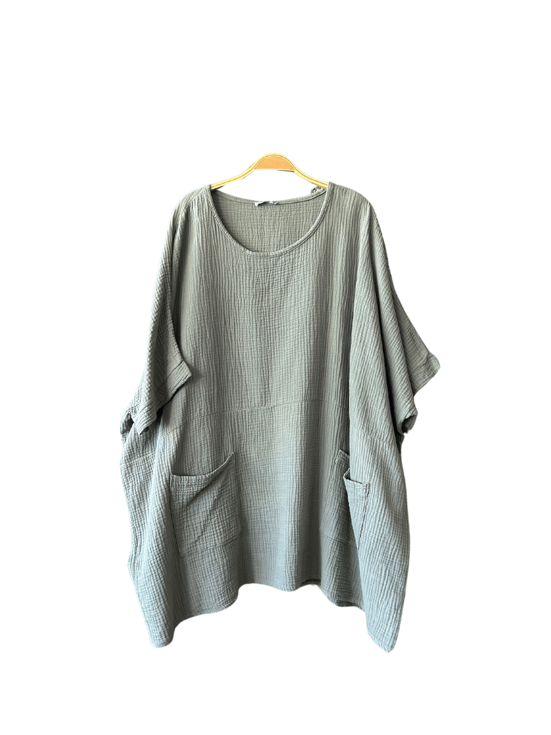 Robe en gaze de coton kaki avec deux poches pratiques et une coupe fluide. Une pièce incontournable pour un look décontracté et stylé. Commandez dès maintenant en ligne avec livraison gratuite.